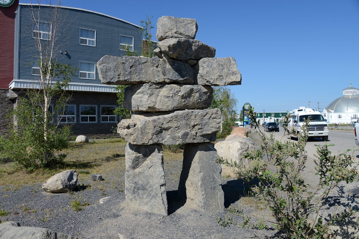 07 Inukshuk Outside The MacKenzie Hotel With Our Lady Of Victory Igloo Church In Inuvik Northwest Territories